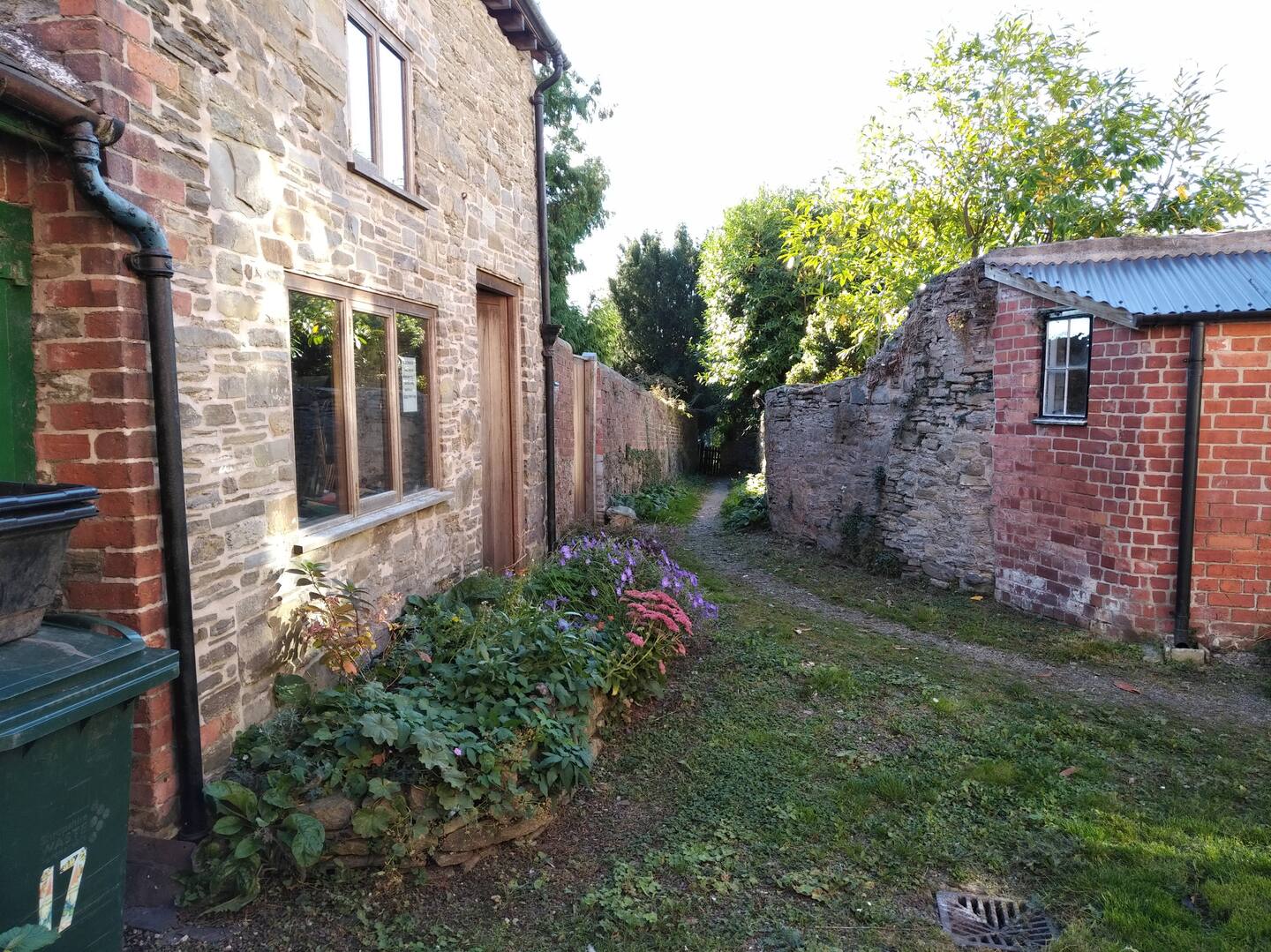 Cottage side view with stone walls